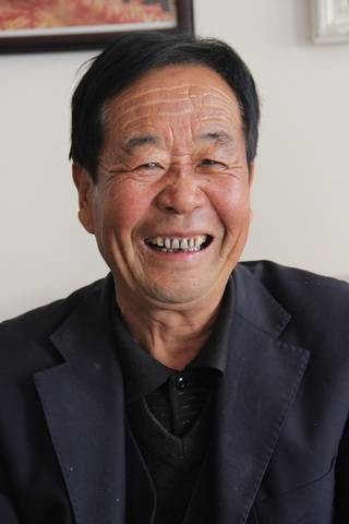 梁玉明（陕北延川县文安驿镇梁家河村村支书）